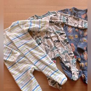 3 magnetic Me footy onesies.